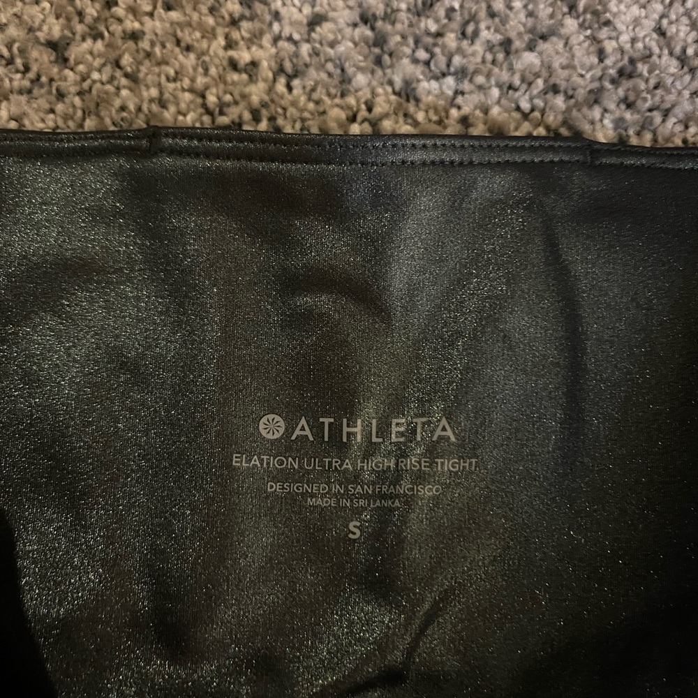 Athleta green holographic leggings, size small